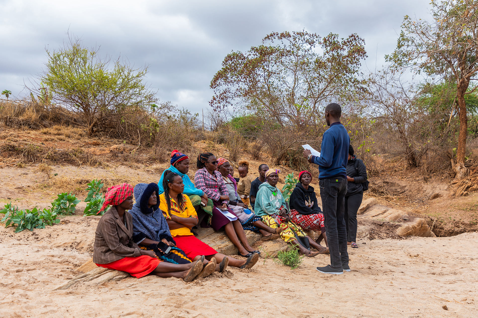A community consultative session at Kwa Ndambuki Sand Dam, Makueni County