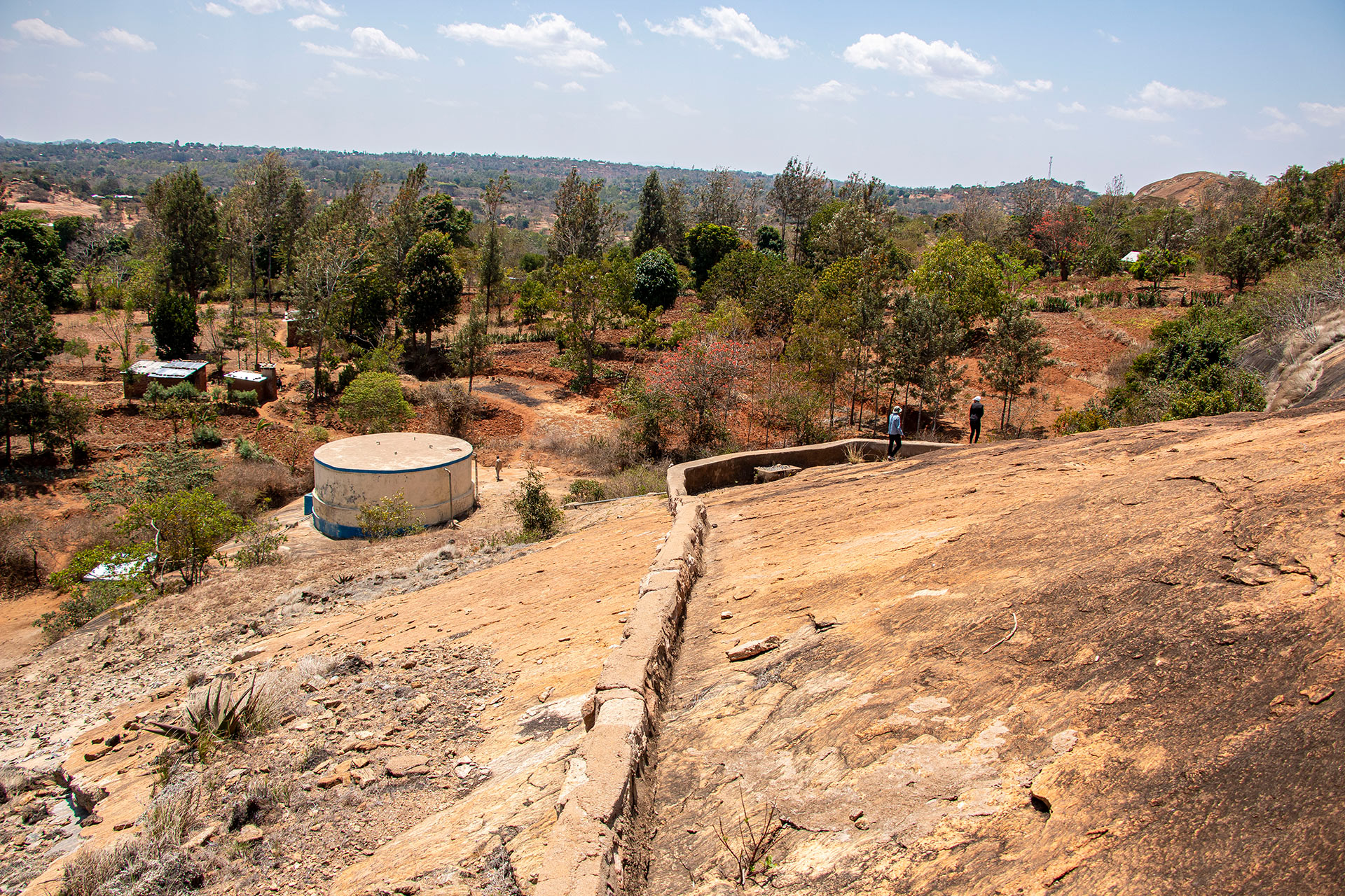 Gutters collecting water and directing them to the storage tank on Kamuyuni rock catchment, Kitui County